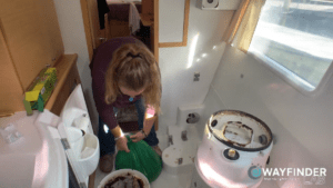How to Clean a Composting Toilet - Emptying the Solid Waste Container