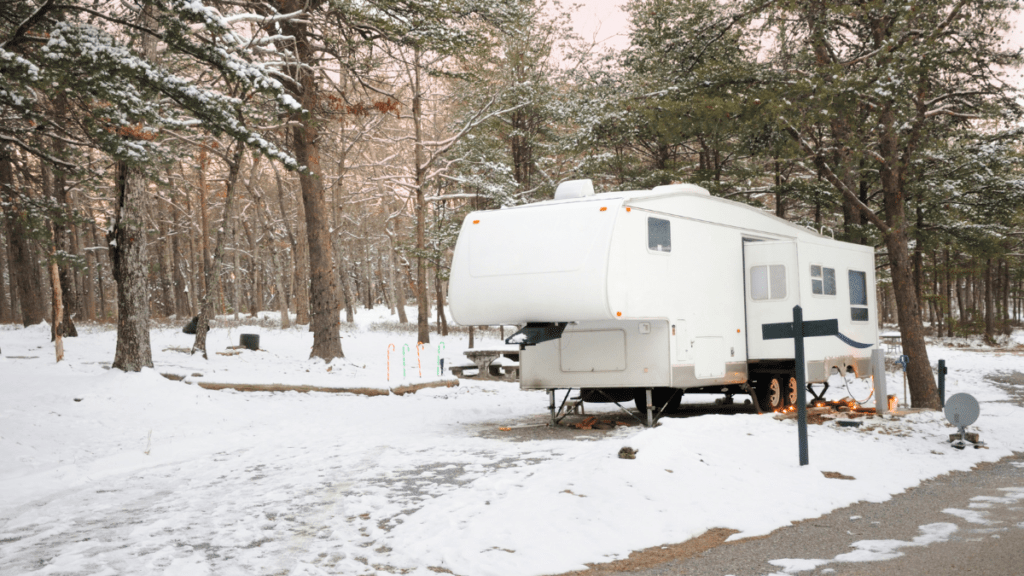 RV in the middle of snowy forest