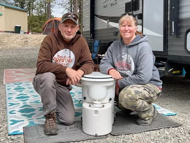 A couple with the Airhead Toilet