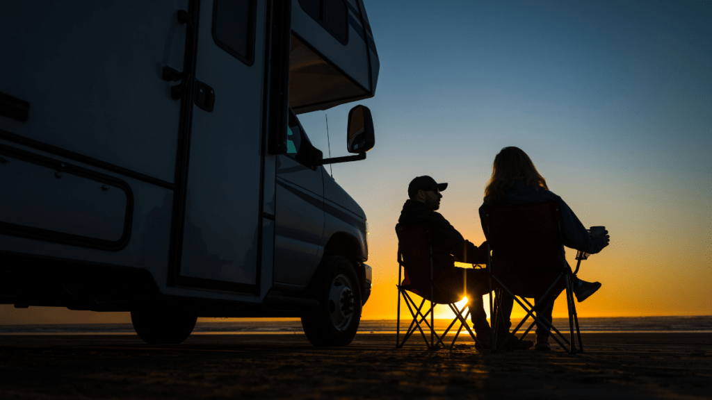 a couple enjoying the sunset | RV for sustainable lifestyle