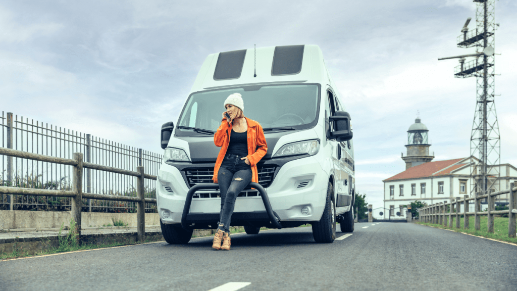 a stealth camper in front of RV - off grid bathroom guide